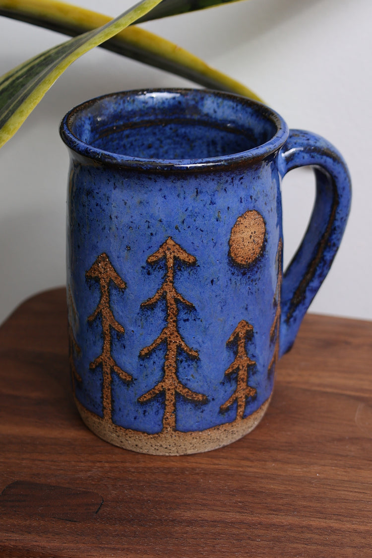 Handmade stoneware mug with nature-inspired design