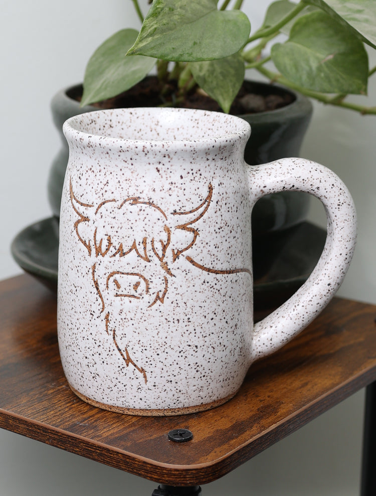 Handmade stoneware mug with nature-inspired design