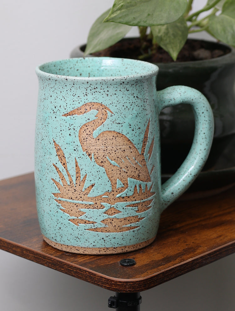 Handmade stoneware mug with nature-inspired design