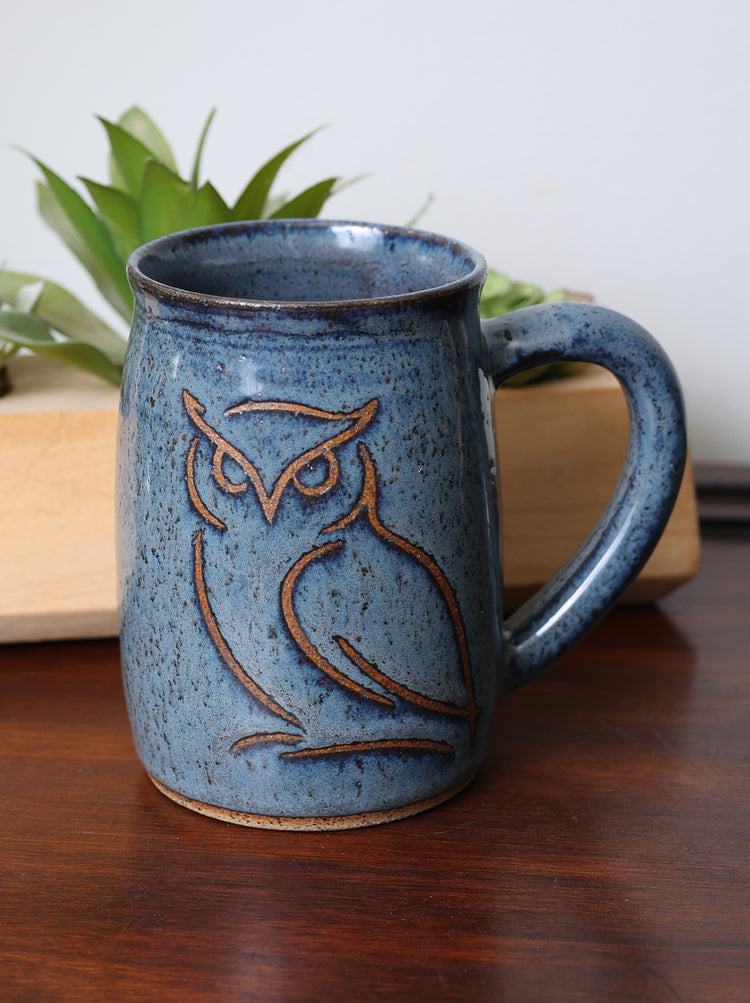 Handmade stoneware mug with nature-inspired design