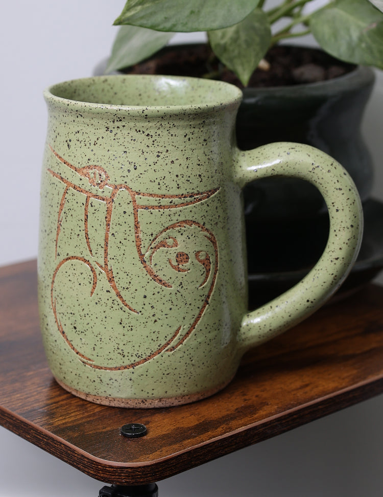 Handmade stoneware mug with nature-inspired design