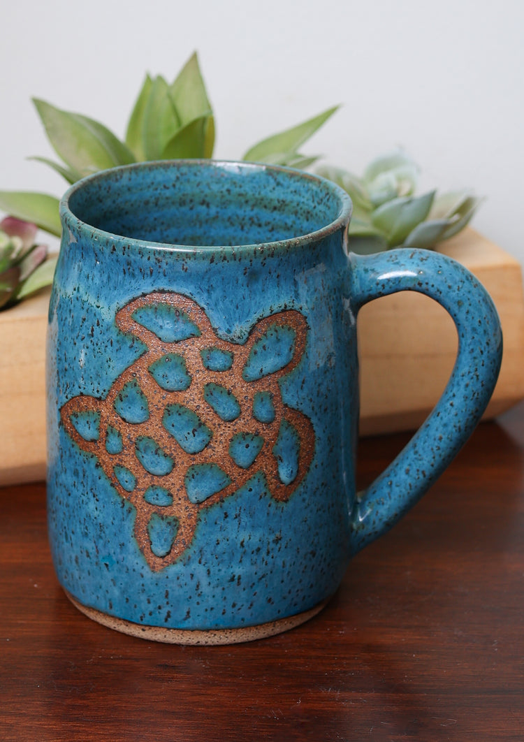 Handmade stoneware mug with nature-inspired design